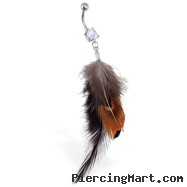 Belly ring with dangling brown and black feathers