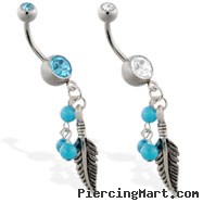 Navel ring with dangling feather and turquoise colored balls