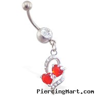 Navel ring with dangling red jeweled hearts within a heart