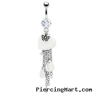 Navel ring with dangling white heart, chains and bow