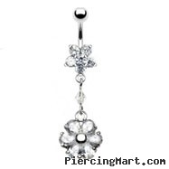 Jeweled star belly ring with dangling flower