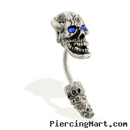 Curved jeweled skull head and tail belly ring