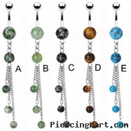 Belly ring with dangling chains and precious stones