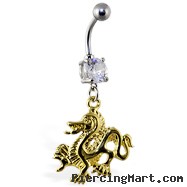 Navel ring with dangling gold colored dragon