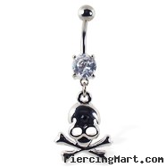 Navel ring with dangling skull and crossbones