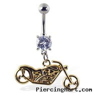 Navel ring with dangling yellow motorcycle