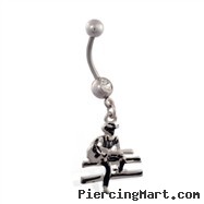 Jeweled belly ring with dangling cowboy on fence