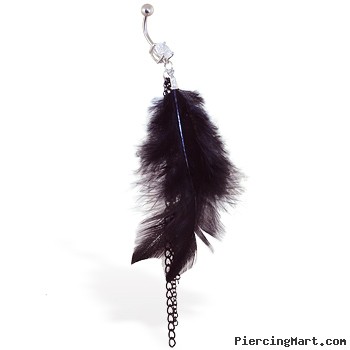 Navel ring with dangling black feathers