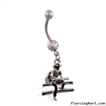 Jeweled belly ring with dangling cowboy on fence