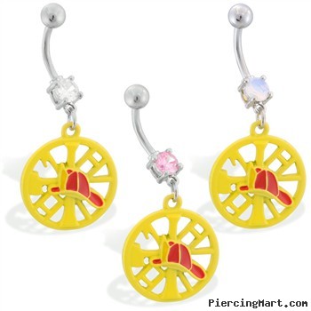 Navel ring with dangling yellow firefighter's emblem